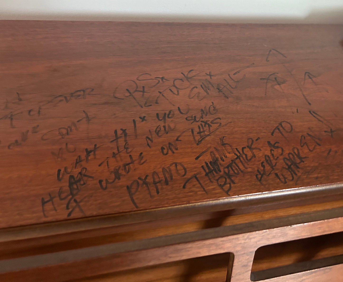 Warren Zevon's former Steinway and Sons piano signed by him and a music exec I can't remember